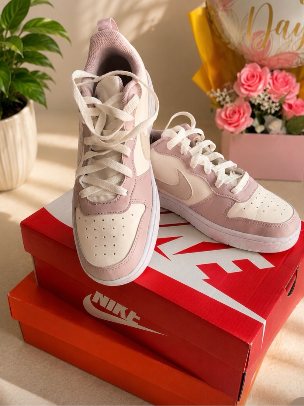 Nike Women’s Low-Top Sneakers in Light Pink and White